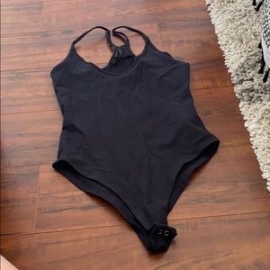 Black halter body suit